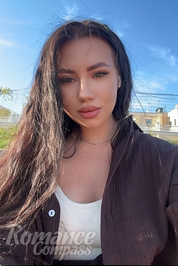 Ukrainian mail order bride Anastasiia from Kyiv with light brown hair and green eye color - image 1
