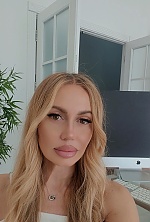 Ukrainian mail order bride Nadiia from Kyiv with blonde hair and brown eye color - image 3