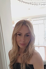 Ukrainian mail order bride Nadiia from Kyiv with blonde hair and brown eye color - image 5