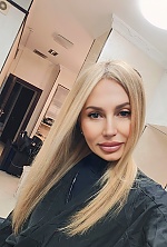 Ukrainian mail order bride Nadiia from Kyiv with blonde hair and brown eye color - image 9
