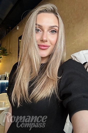 Ukrainian mail order bride Yana from Kyiv with blonde hair and green eye color - image 1