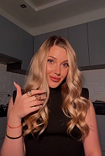 Ukrainian mail order bride Yana from Kyiv with blonde hair and green eye color - image 11