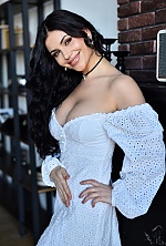 Ukrainian mail order bride Oksana from Kyiv with light brown hair and green eye color - image 8