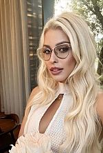 Ukrainian mail order bride Anna from Kyiv with blonde hair and green eye color - image 5