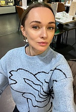 Ukrainian mail order bride Elina from Warsaw with light brown hair and blue eye color - image 6