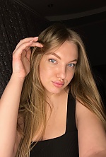 Ukrainian mail order bride Karolina from Mykolayiv with blonde hair and blue eye color - image 4