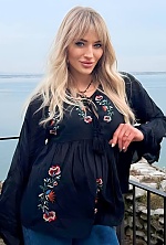 Ukrainian mail order bride Kateryna from Turin with blonde hair and blue eye color - image 3