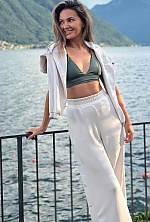 Ukrainian mail order bride Olga from Warsaw with light brown hair and green eye color - image 8