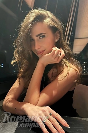 Ukrainian mail order bride Anna from Kyiv with light brown hair and blue eye color - image 1