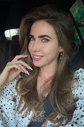 Ukrainian mail order bride Anna from Kyiv with light brown hair and blue eye color - image 1