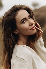 Ukrainian mail order bride Anna from Kyiv with light brown hair and blue eye color - image 7