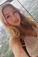 Ukrainian mail order bride Elizaveta from Kyiv with light brown hair and blue eye color - image 9