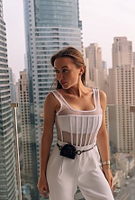 Ukrainian mail order bride Snezhana from Dubai with light brown hair and green eye color - image 9