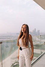 Ukrainian mail order bride Snezhana from Dubai with light brown hair and green eye color - image 2