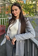 Ukrainian mail order bride Maria from Kyiv with black hair and green eye color - image 6