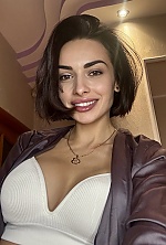 Ukrainian mail order bride Valeriya from Kyiv with black hair and green eye color - image 7