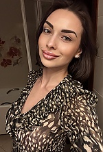 Ukrainian mail order bride Valeriya from Kyiv with black hair and green eye color - image 4