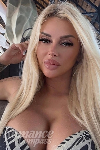 Ukrainian mail order bride Roksolana from Lviv with blonde hair and green eye color - image 1
