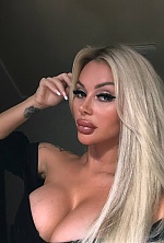 Ukrainian mail order bride Roksolana from Lviv with blonde hair and green eye color - image 8