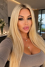 Ukrainian mail order bride Roksolana from Lviv with blonde hair and green eye color - image 4