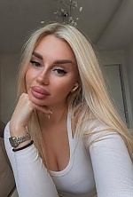 Ukrainian mail order bride Roksolana from Lviv with blonde hair and green eye color - image 6