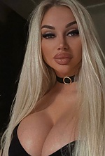 Ukrainian mail order bride Roksolana from Lviv with blonde hair and green eye color - image 8