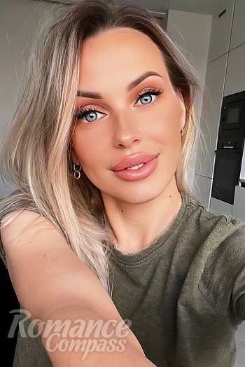 Ukrainian mail order bride Irina from Kyiv with blonde hair and grey eye color - image 1