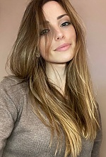 Ukrainian mail order bride Maria from Warsaw with brunette hair and green eye color - image 2