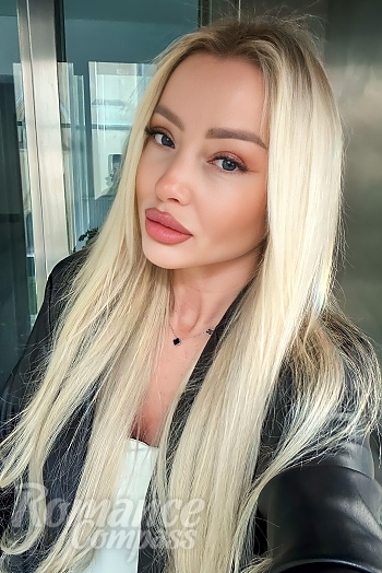 Ukrainian mail order bride Irina from Bratislava with blonde hair and blue eye color - image 1