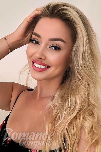 Ukrainian mail order bride Irina from Bratislava with blonde hair and blue eye color - image 1