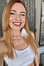 Ukrainian mail order bride Veronica from Kyiv with red hair and green eye color - image 10