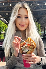Ukrainian mail order bride Olga from Kyiv with blonde hair and blue eye color - image 8