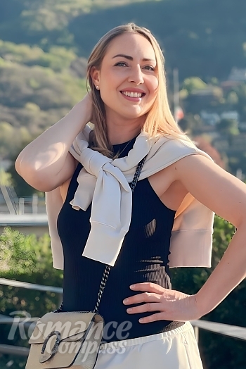 Ukrainian mail order bride Liliia from Lecco with blonde hair and green eye color - image 1