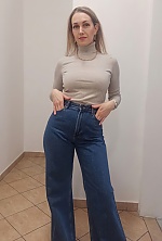 Ukrainian mail order bride Kseniia from Budapest with light brown hair and grey eye color - image 4