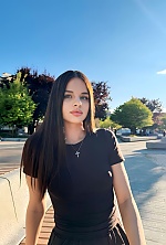 Ukrainian mail order bride Karolina from Kyiv with black hair and green eye color - image 5