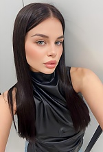 Ukrainian mail order bride Karolina from Kyiv with black hair and green eye color - image 7