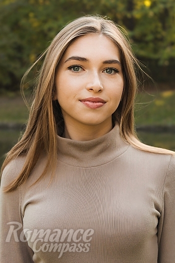 Ukrainian mail order bride Maryna from Uman with light brown hair and blue eye color - image 1