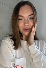 Ukrainian mail order bride Oleksandra from Bucharest with light brown hair and blue eye color - image 9