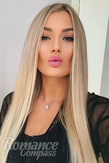 Ukrainian mail order bride Olena from Berlin with blonde hair and blue eye color - image 1