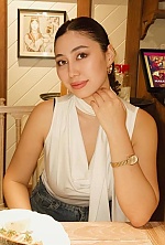 Ukrainian mail order bride Aishat from New York with black hair and brown eye color - image 2