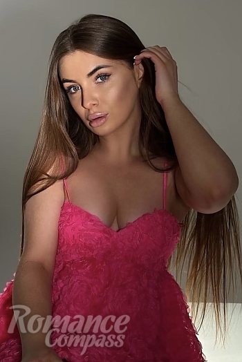 Ukrainian mail order bride Lyzaveta from Kyiv with auburn hair and blue eye color - image 1