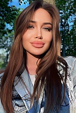 Ukrainian mail order bride Anastasia from Kyiv with auburn hair and green eye color - image 3