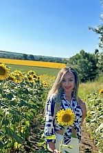 Ukrainian mail order bride Tetiana from Poltava with black hair and brown eye color - image 17
