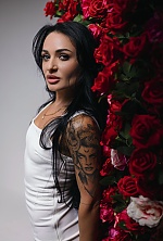 Ukrainian mail order bride Anastasiya from Kamyanske with black hair and grey eye color - image 12