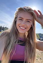 Ukrainian mail order bride Kateryna from Lyon with blonde hair and blue eye color - image 10