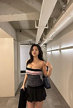 Ukrainian mail order bride Huangdai from Guilin with black hair and black eye color - image 8