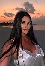 Ukrainian mail order bride Vitalina from Poltava with black hair and green eye color - image 2