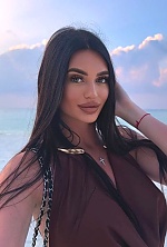 Ukrainian mail order bride Vitalina from Poltava with black hair and green eye color - image 3