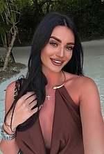 Ukrainian mail order bride Vitalina from Poltava with black hair and green eye color - image 4