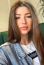 Ukrainian mail order bride Oksana from Kyiv with black hair and blue eye color - image 6